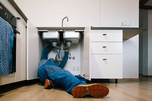 Professional Drain Cleaning technician working in Lee's Summit, MO